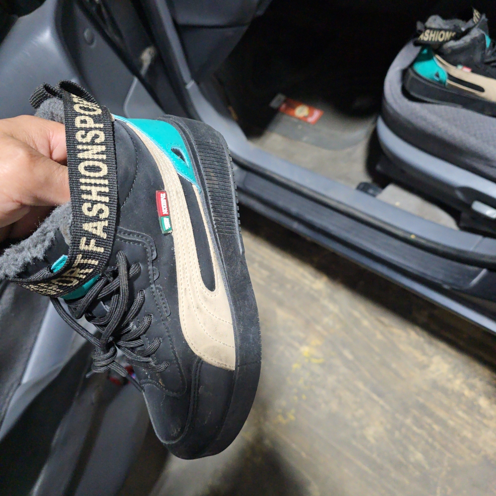 Black and Beige High-Top Sneakers with Teal Accents